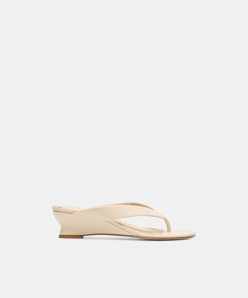 EVARLY Alabaster Leather Round-Toe Thong Wedges | Dolce Vita